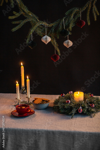 winter holidays and celebration concept - close up of christmas wreath, ginge...