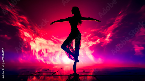 Silhouette of woman dancing in front of purple and pink background.