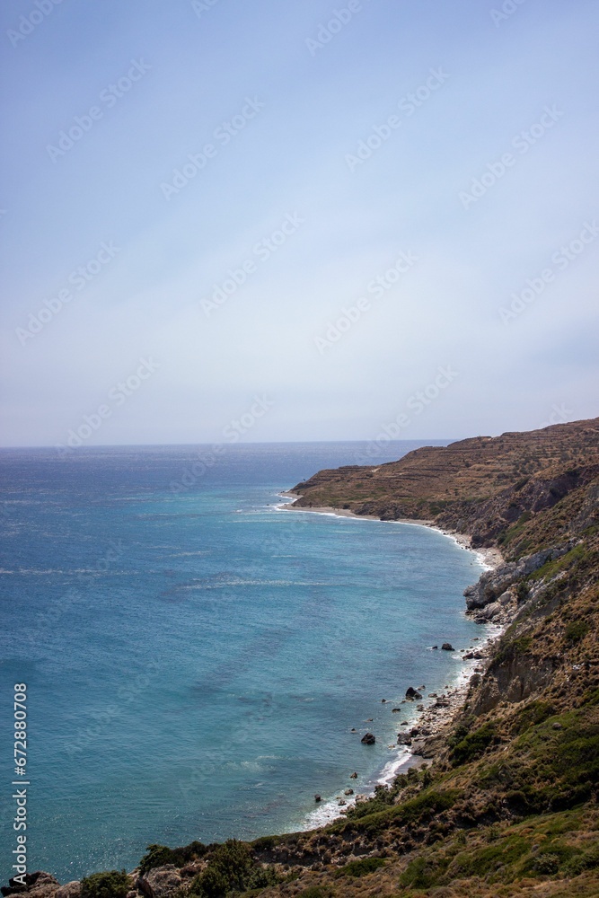 Scenic view of the ocean coastline of Saint George Beach in Ikaria, Greece.