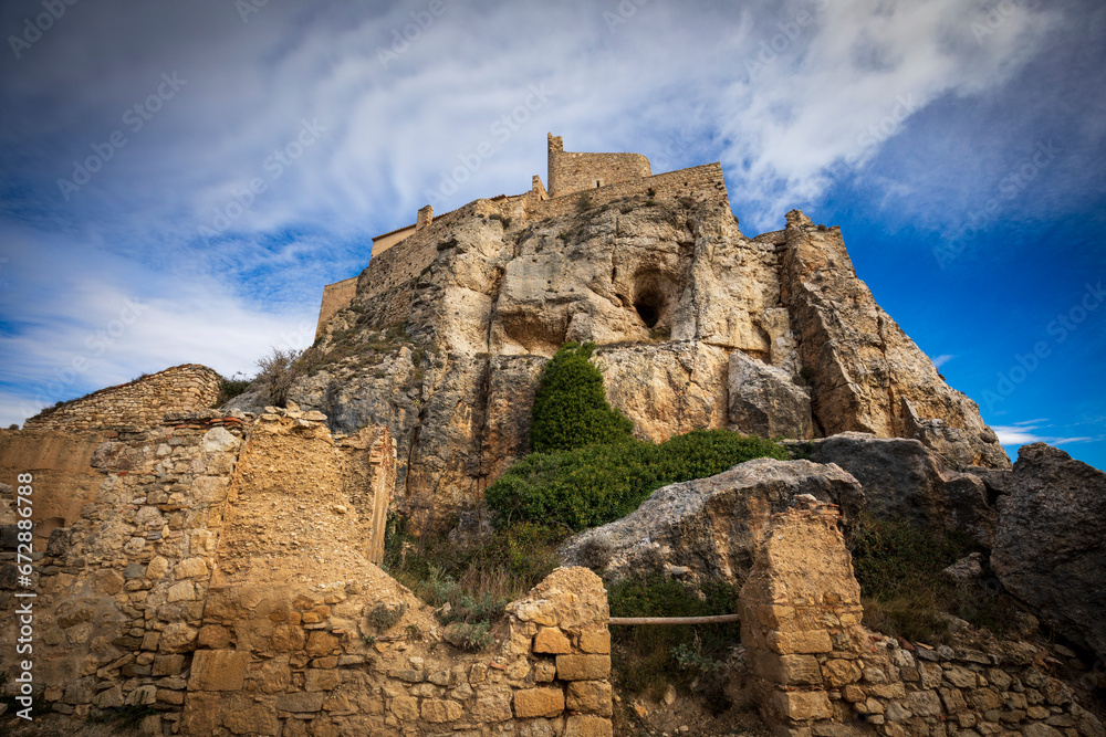 View from below of the imposing Morella Castle, Castellón, Spain, in midday light