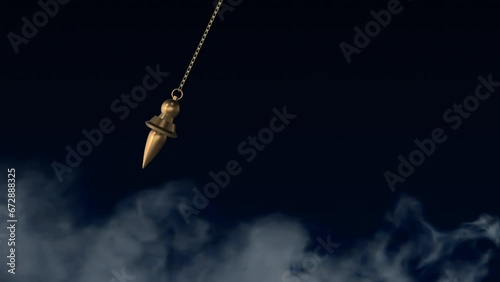 Hypnotizing idea with a mysterious backdrop and pendulum photo