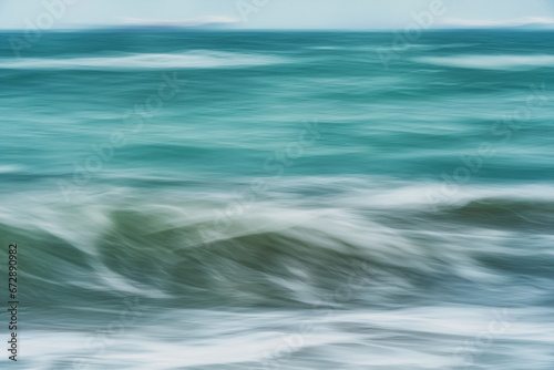 Abstract Intentional Camera Movement of Ocean Waves Moving Creating a Painterly Texture Effect.