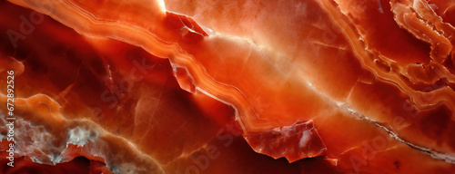 Closeup of a polished Carnelian red agate texture on a black background panorama copy space photo