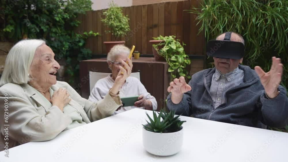 Old people using innovative technology in a nursing home Old people using innovative technology in a nursing home