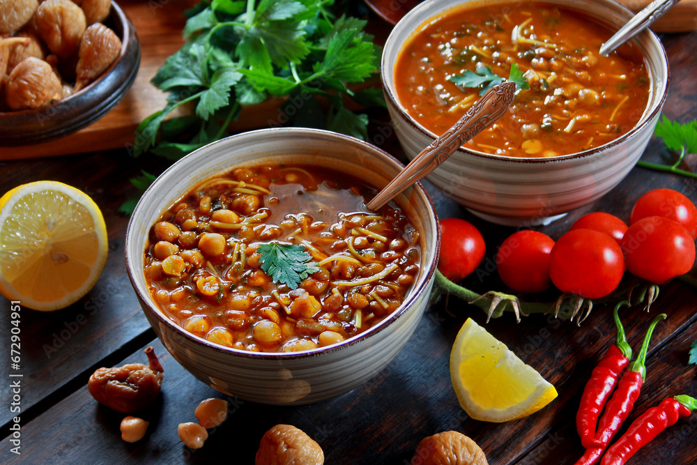 Harira  – traditional Moroccan tomato soup with chickpeas and lentils - obrazy, fototapety, plakaty 