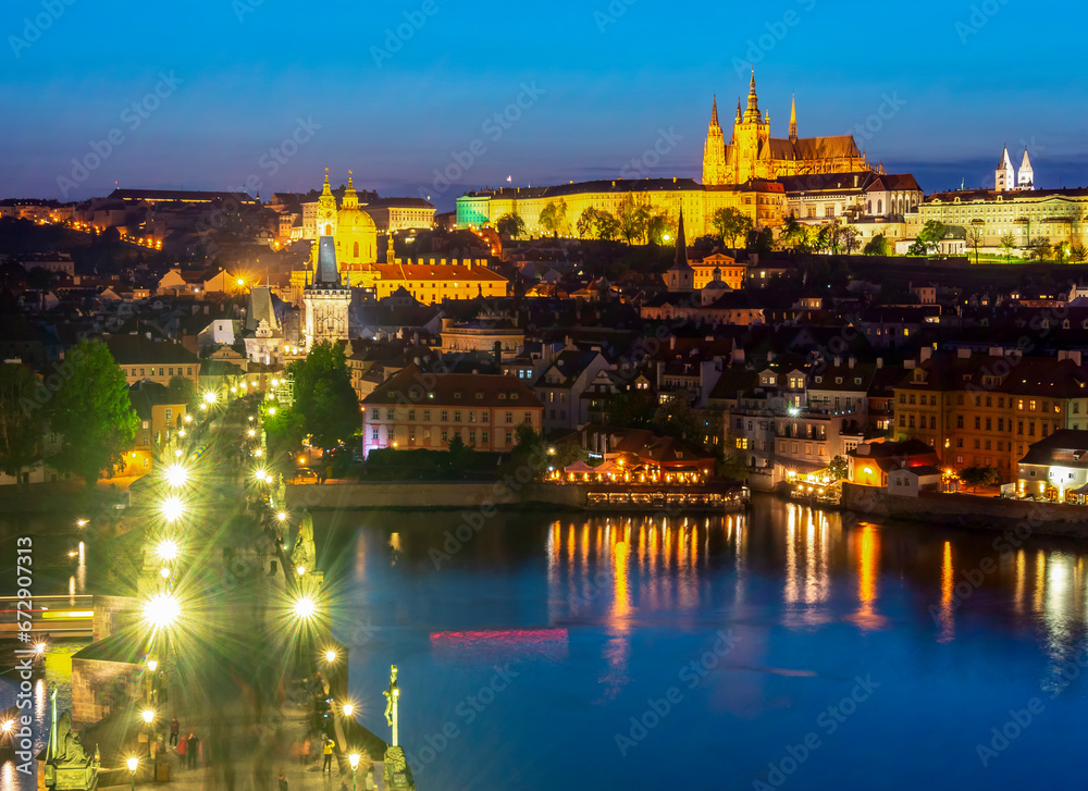 Prague cityscape with Charles bridge, Vltava river and Hradcany castle at night, Czech Republic