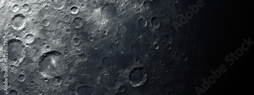 Photographie Detailed moon surface with craters and textures.
