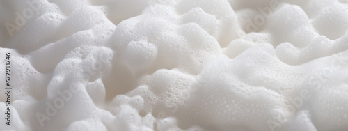 Macro shot of white foam texture.