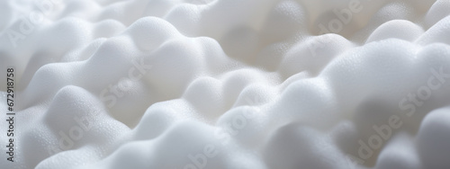 Macro shot of white foam texture.
