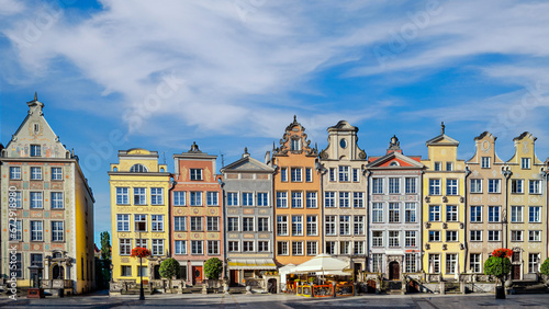 Historical houses in old town center of Gdansk, Poland, on a bright sunny day. Panorama image.