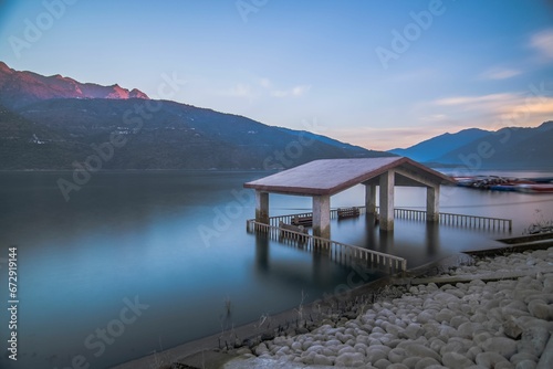 Tranquil scene of Tehri Lake with mountains in the background. Uttarakhand, India. © Wirestock