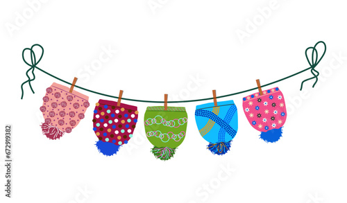 Dry winter hats. Children hats drying on sun. Hats attached with clothespins to cord. Vector illustration