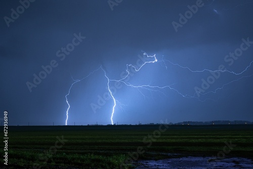 Frightening shot of striking thunderbolts during a stormy night
