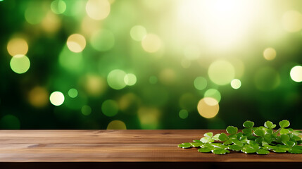 Empty wooden table mockup with defocused green and gold background, shamrock and golden glitter for Saint Patrick's Day designs