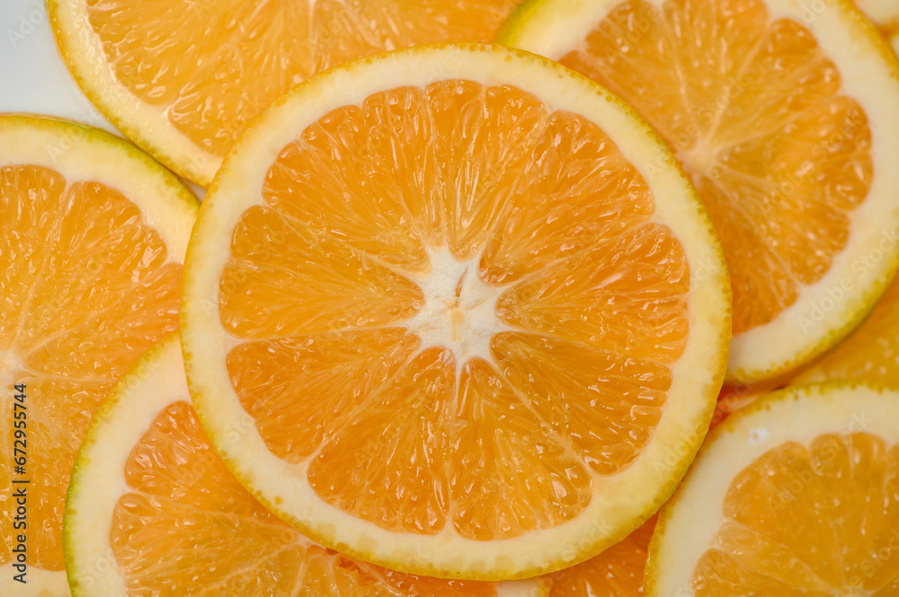 sliced orange laid out on the table as a food background 10 sliced orange laid out on the table as a food background 10