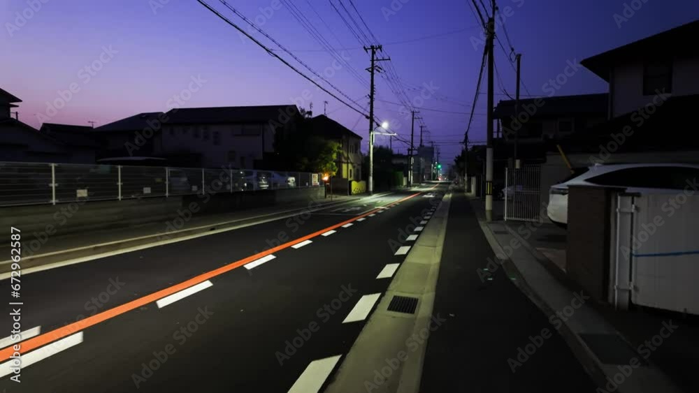 Predawn walk on empty street in quiet residential neighborhood in Japan Predawn walk on empty street in quiet residential neighborhood in Japan
