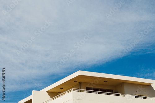 White minimalistic building and blue sky