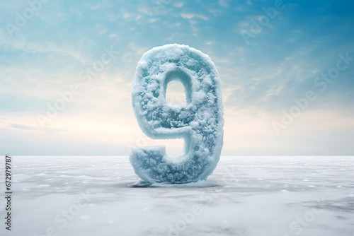 The number nine in the cold, against the backdrop of winter during a snowfall. Frozen number nine in the midst of the cold season. A giant number nine in the cold