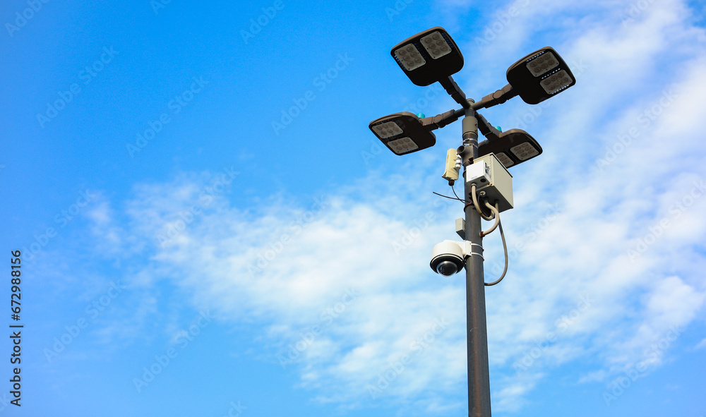 surveillance camera on a city street, symbolizing security and monitoring, framed against an urban backdrop with a neutral tone surveillance camera on a city street, symbolizing security and monitoring, framed against an urban backdrop with a neutral tone