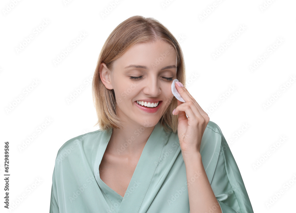 Young woman cleaning her face with cotton pad on white background Young woman cleaning her face with cotton pad on white background