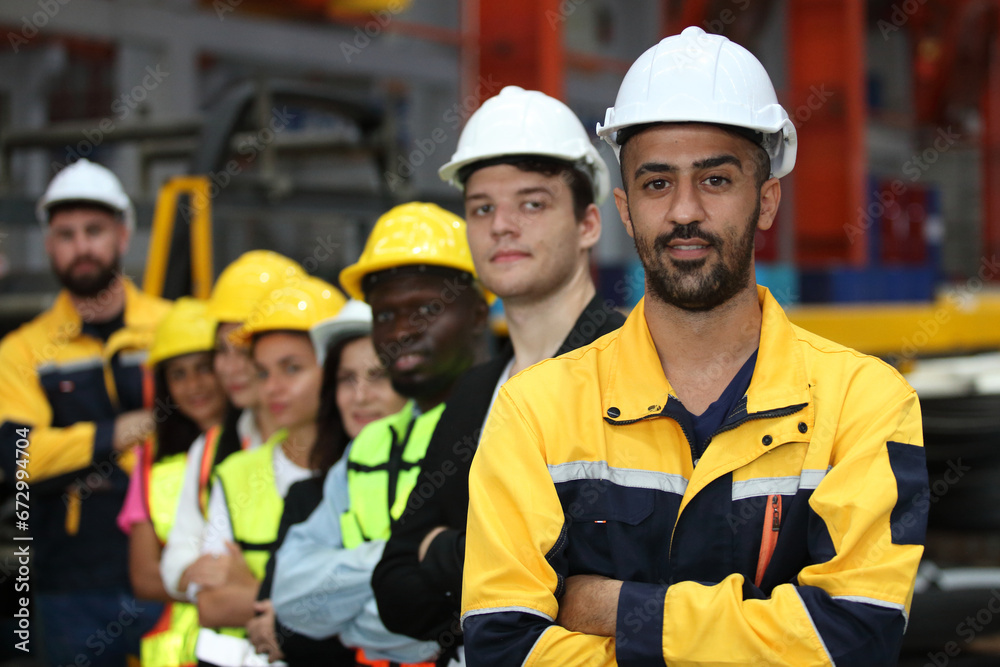 engineer team or worker team with safety uniform standing at industry. engineer team or worker team with safety uniform standing at industry.