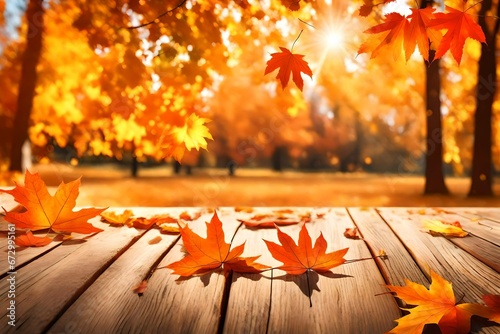 autumn leaves on the wooden background