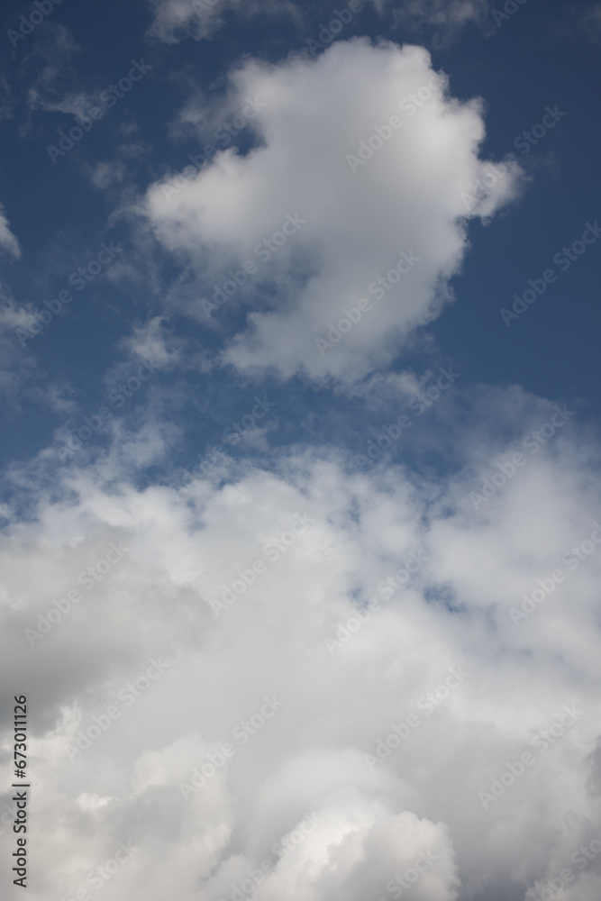 Blue sky. Beautiful Cumulus clouds flying across the sky, Beautiful natural clouds on the sky, deep blue sky Blue sky. Beautiful Cumulus clouds flying across the sky, Beautiful natural clouds on the sky, deep blue sky