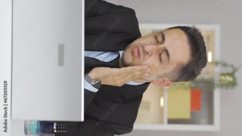 Vertical video of Home office worker man teeth aches and pains. Vertical video of Home office worker man teeth aches and pains.