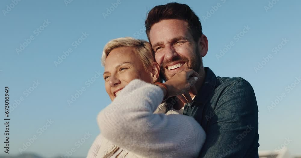 Love, smile or happy couple hug at beach to relax on holiday vacation in summer romance together. Travel, lovers support or calm woman laughing with affection, care or man in nature at sea for view Love, smile or happy couple hug at beach to relax on holiday vacation in summer romance together. Travel, lovers support or calm woman laughing with affection, care or man in nature at sea for view