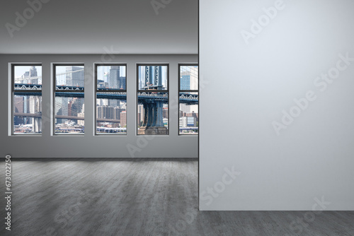 Downtown New York City Lower Manhattan Skyline Buildings. High Floor Window. White mockup wall. Empty room Interior Skyscrapers View Cityscape. Financial district. Brooklyn Bridge. 3d rendering.