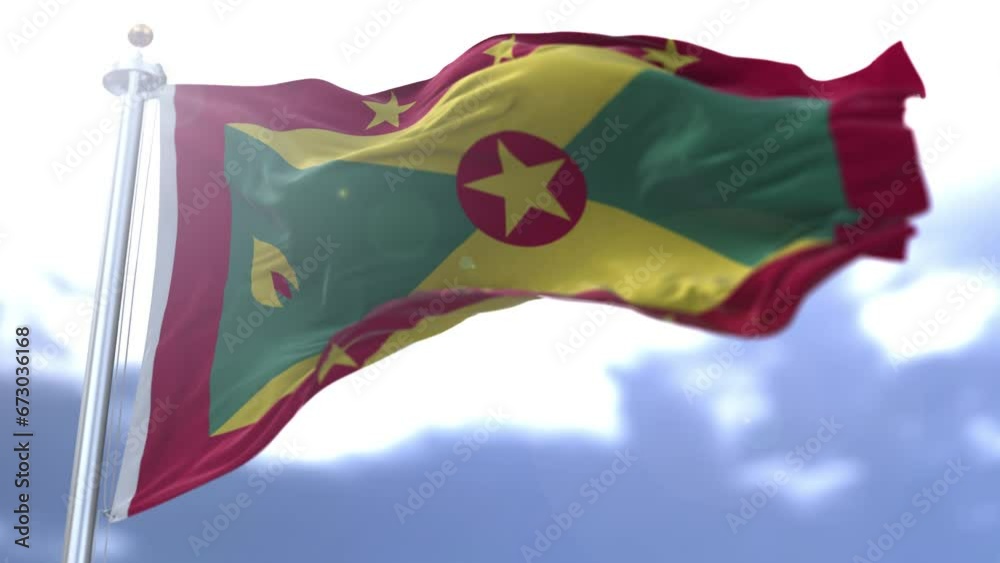Grenada flag waving against the sky. High quality 4k footage