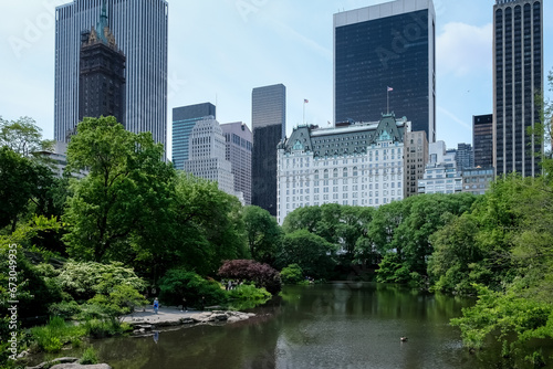 View of Manhanttan skyline as seen from the Pond, one of seven bodies of water in Central Park located near Grand Army Plaza, across Central Park South from the Plaza Hotel, slightly west of Fifth Av. © Mltz