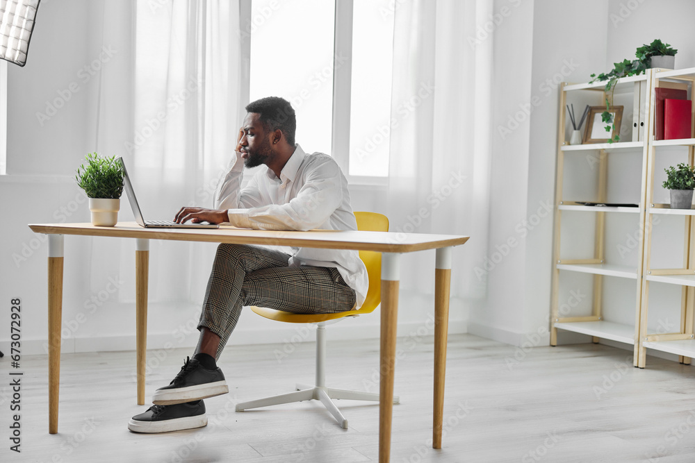 freelancer man american student using job education computer online laptop office african freelancer man american student using job education computer online laptop office african