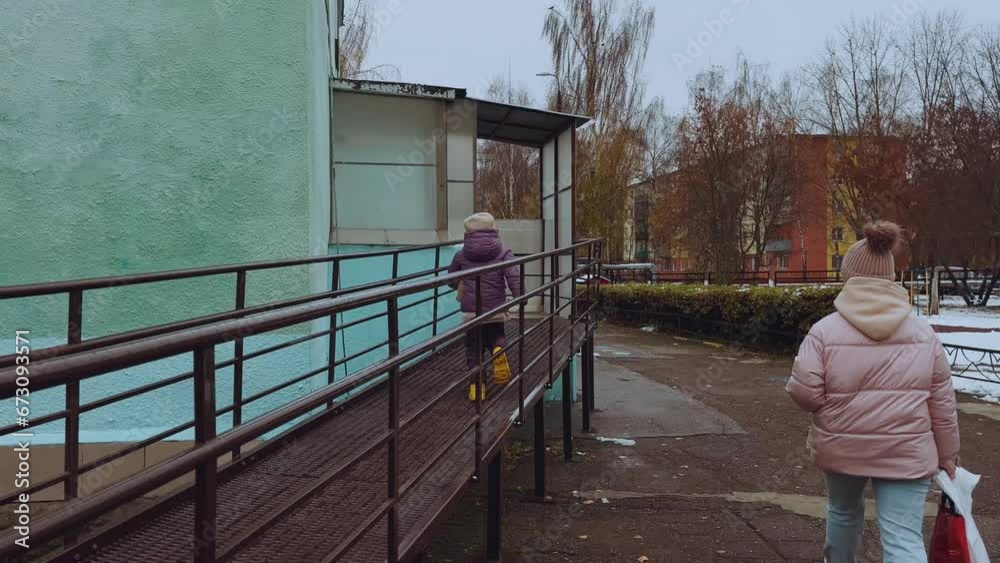 12. The girl goes to kindergarten with her mother, the child goes to kindergarten 12. The girl goes to kindergarten with her mother, the child goes to kindergarten