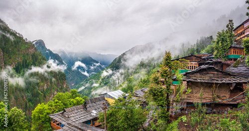 Panoramic view of Jakha, It is a small village also called hangining village because it looks hanging on the Himalayas mountains enroute Rupin Pass trail in Shimla district of Himachal Pradesh, India.