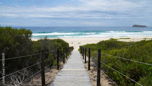 Fototapeta Naklejka Na Ścianę i Meble -  path to the beach.access to the sea. fence near the ocean, beach in Australia