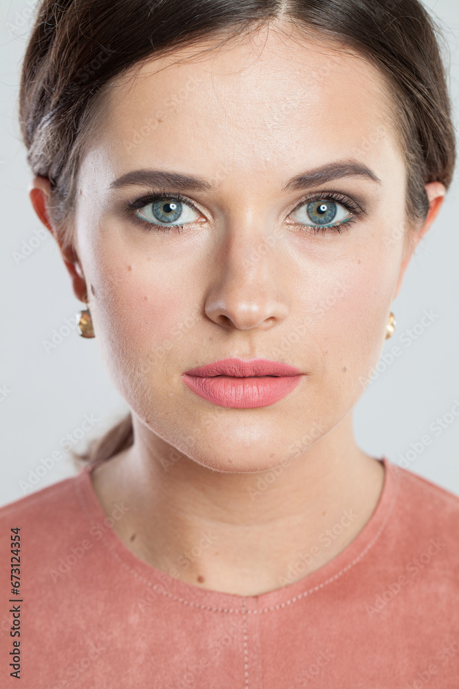 Perfect female model face with natural clear skin without retouch. Young brunette woman without retouching, closeup studio portrait Perfect female model face with natural clear skin without retouch. Young brunette woman without retouching, closeup studio portrait