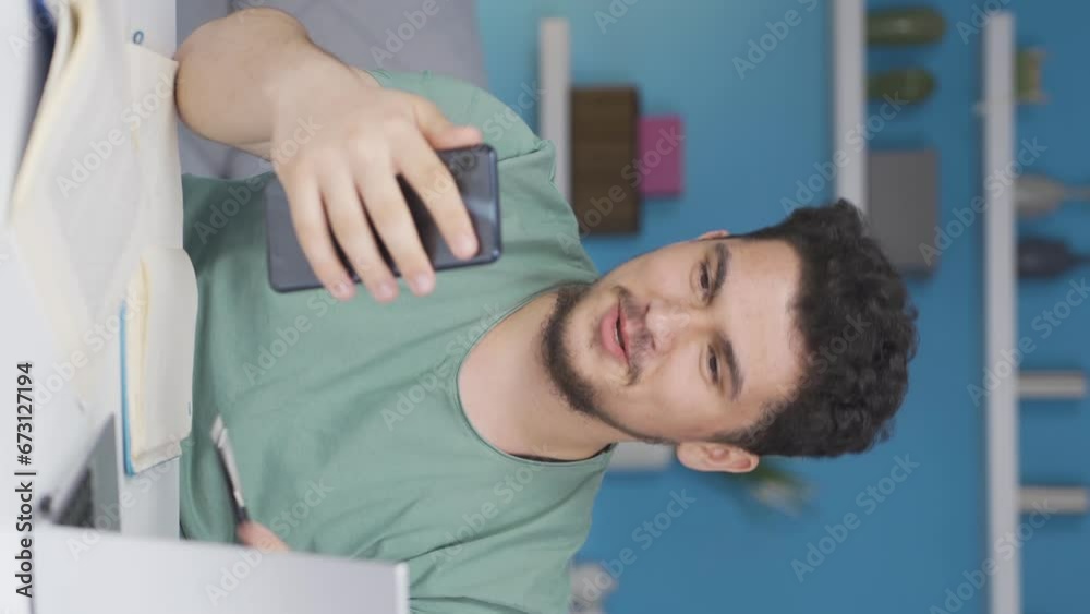 Vertical video of Student Talking About Lesson On The Phone. Vertical video of Student Talking About Lesson On The Phone.
