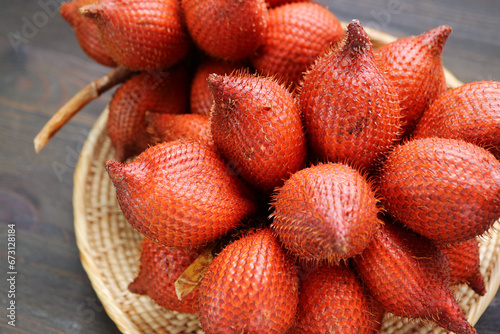 Closeup of Clusters of Fresh Ripe Salak or Snakeskin Fruit in a Basket