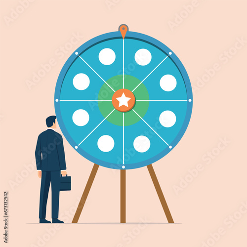 candidate choosing, new applicant hiring, lucky winner, human resources selecting new talent and laying off employees concepts, human resources staff selecting candidates using a lucky draw wheel