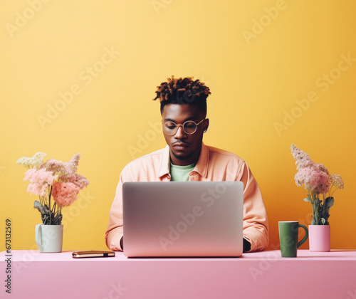 African american student working on a laptop. photo