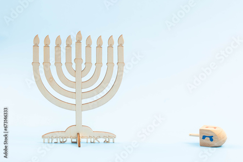Jewish holiday Hanukkah concept. Menorah – traditional wooden candelabrum or hanukkiah.