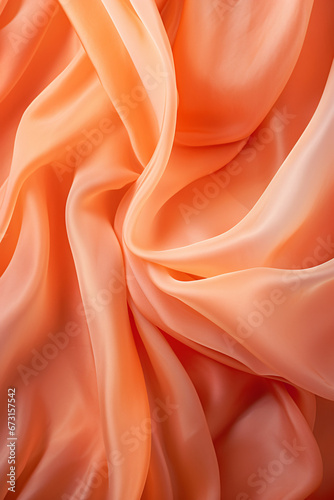 Elegant folds of peach colored fabric. Apricot Crush color trend. Textile design and fluidity. Design for fashion banner, background texture, or luxury branding 