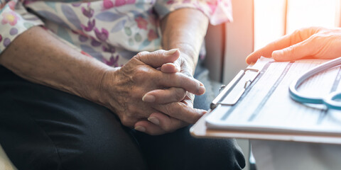 Elderly senior, old menopause elder woman patient having geriatric doctor consulting and diagnostic examining on aging and mental health care in medical clinic office or hospital examination room
