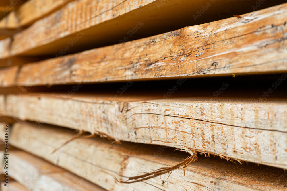A stack of rough-cut wooden planks set up to dry, Bavaria, Germany. A stack of rough-cut wooden planks set up to dry, Bavaria, Germany.