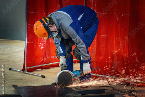 Man with circular hand saw....