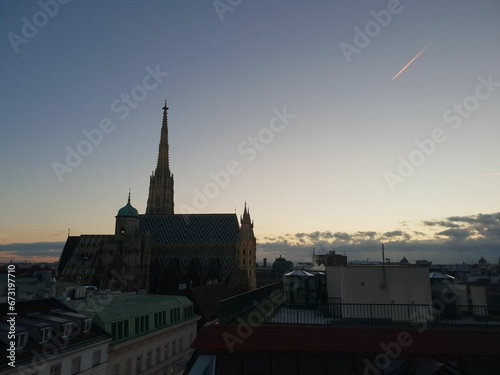 Scenic view of the Vienna cityscape with St. Stephan cathedral at sunset in Austria