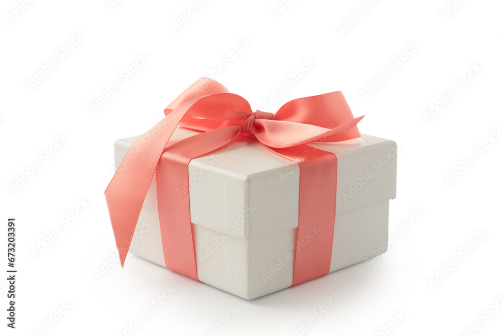 White gift box with peach color ribbon isolated on white background White gift box with peach color ribbon isolated on white background