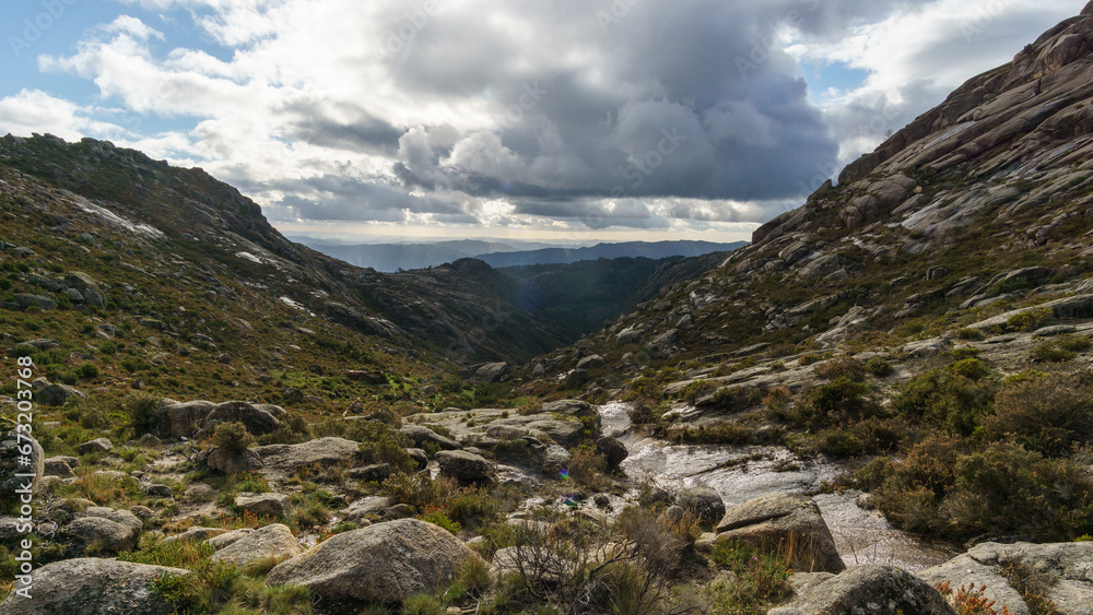 Mountain landscape of granite rocks with green vegetation, Peneda-Geres National Park, Vilar da Veiga, Portugal