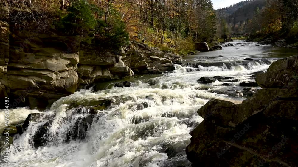 Stormy stream of water in Ukrainian Carpathians at the Probiy waterfall. Crystal pure water Stormy stream of water in Ukrainian Carpathians at the Probiy waterfall. Crystal pure water